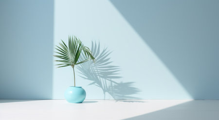 palm leaf against the blue wall.の素材