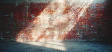a very large empty brick wall with light coming through.の素材