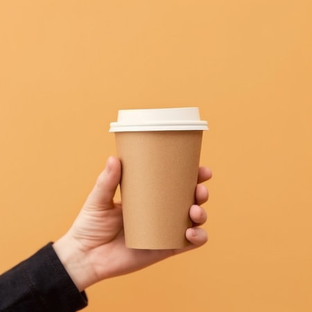 Paper coffee cup mockup in hand. Illustration Generative AIの素材