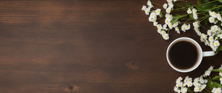 A warm cup of coffee sits beside a bouquet of fresh pink and white flowers on a rustic wooden table, creating a tranquil atmosphere perfect for morning relaxation.の素材