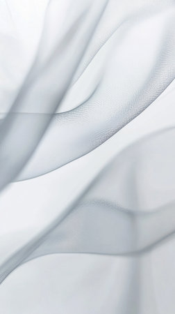 Light and airy fabric flows gently, creating soft curves and delicate waves. The translucent material catches light beautifully, transforming the space with its elegance.の素材