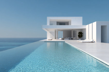 A luxurious villa features a stunning infinity pool that extends towards the ocean. Sunlight reflects off the clear water, creating a tranquil atmosphere..の素材