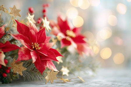 Red poinsettias and golden stars are arranged together, creating a warm and inviting atmosphere for holiday celebrations. Soft lights glow in the background, adding to the charm.の素材