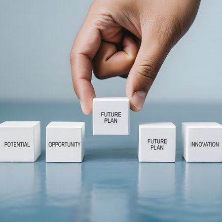 Close up of human hand arranging white cubes with text. Success in business concept.の素材