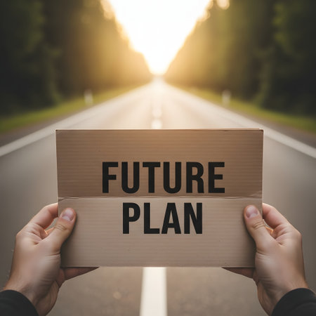 Man holding a cardboard box with future plan text on the road backgroundの素材