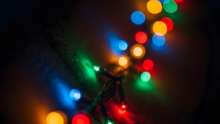 Colorful Christmas lights on a dark background. Bokeh.の素材