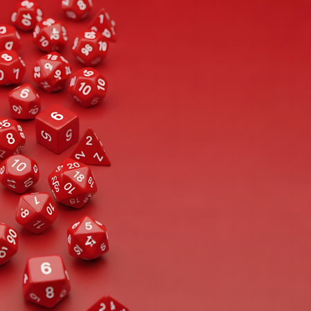 A close-up, top-down view of numerous red polyhedral dice scattered along the left edge of a solid red background, leaving significant copy space on the right side for text or graphic elements.の素材
