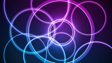 A vibrant image featuring multiple neon-colored circles intersecting each other against a dark background. The circles emit a glowing light in shades of blue, purple, and pink, creating a dynamic and futuristic visual effect.の素材