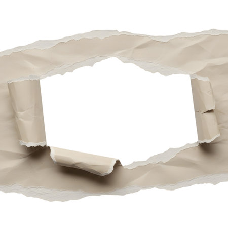 An image of a piece of paper with a torn section revealing a blank white space underneath. The paper appears worn and aged, adding a vintage feel to the overall composition. The torn edges are jagged and uneven, creating a sense of spontaneity and imperfection.の素材