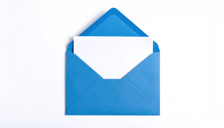 Opened blue paper envelope mockup with paper sheet flat lay on white background with copy space, perfect for stationery design, branding presentations, invitation templates, business correspondenceの素材