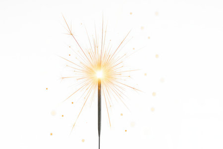 Fireworks sparkler gunshot macro radiant core with fine needle sparks flying outward studio on whiteの素材