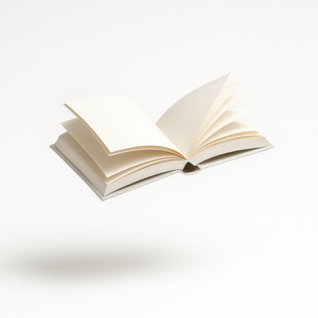 Open hardcover book flying in mid air above pure white background pages slightly curved imagination reading and education concept for learning poster and publishing designの素材
