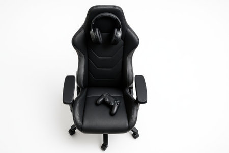 Top down professional photograph of leather gaming chair with headset and controller on white background modern gamer workspace concept for esport setup office and streaming designの素材
