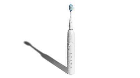Electric toothbrush on a white background. 3D illustration. Copy space.の素材