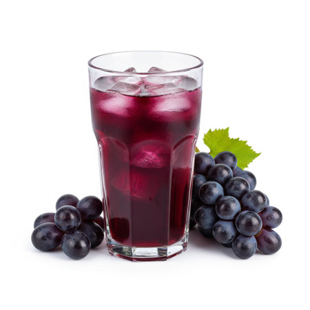 Grape juice in glass isolated on white background. Clipping pathの素材