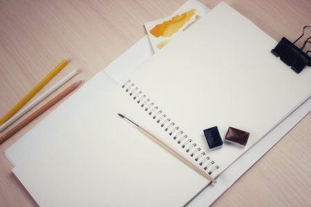 Layout of art materials at an angle, mockup notebook for inserting illustrationsの写真素材