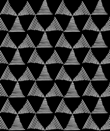 Seamless fashionable pattern of tribal african ornament consisting of triangles in lines. In black and white colors. Graphical hand drawn background. Vector illustrationのイラスト素材