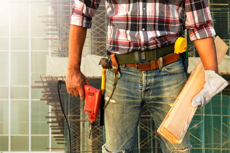 Construction worker checking location work siteの写真素材