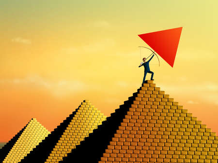 Man holding a red flag atop a pyramid, proclaiming victory, behind 3 pyramids and orange sky.3d.の写真素材
