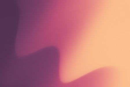 Purple and orange gradient background with waves, movement and textured effectの写真素材
