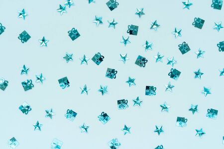Creative festive background from sky blue stars. Flat lay. New year concept. Open compositionの写真素材