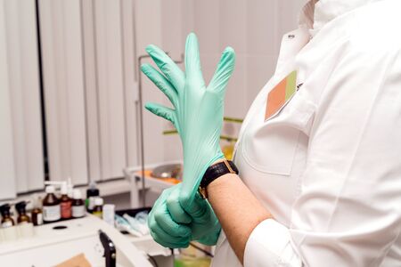 Medical procedures in the office of the ENT specialist. Otorhinolaryngologist doctor pediatrician...