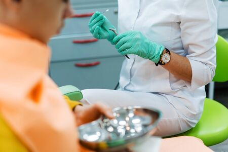 Medical procedures in the office of the ENT specialist. Otorhinolaryngologist doctor pediatrician...