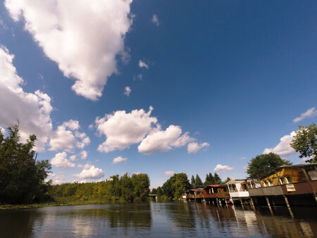 Driving boat on waterの写真素材