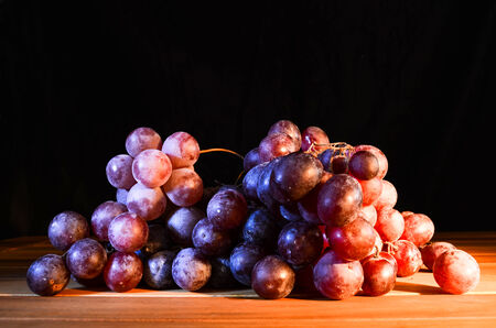 Fresh red blue wine grapesの写真素材