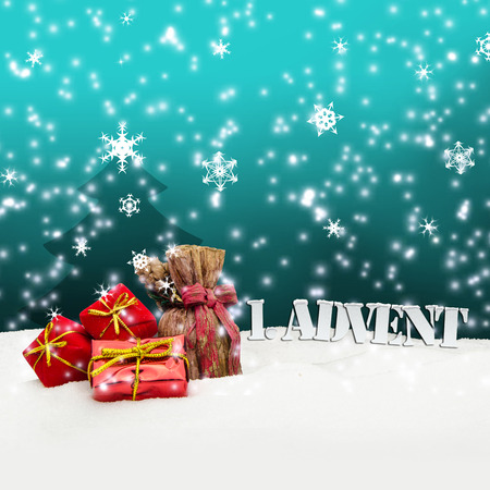 Christmas advent with gift or present and snow backgroundの写真素材