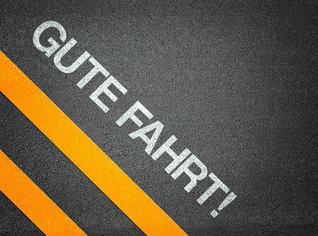 German - Gute Fahrt - good ride - Text Writing Road Asphalt Word Floor Groundの写真素材