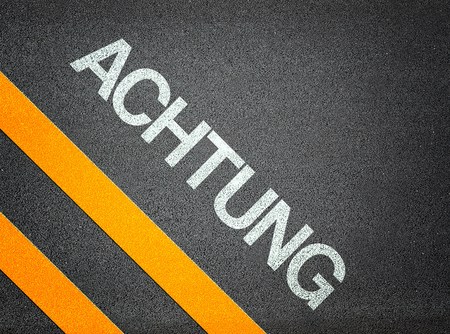 Achtung German Attention Text Road Asphaltの写真素材