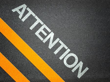 Attention Text Road Asphalt Notice Floor Writingの写真素材