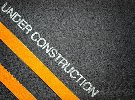 Under Construction Text Writing Road Asphalt Word Floor Groundの写真素材
