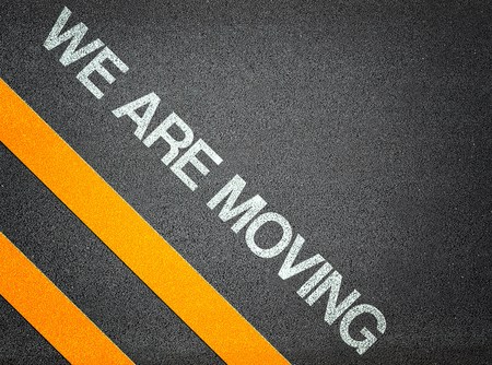 We are moving - Text Writing Road Asphalt Word Floor Groundの写真素材