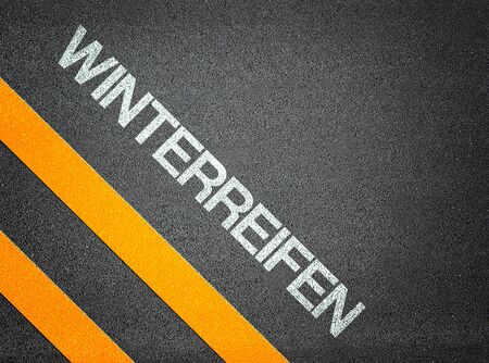 German Winterreifen Winter tires Text Writing Road Asphalt Word Floor Groundの写真素材