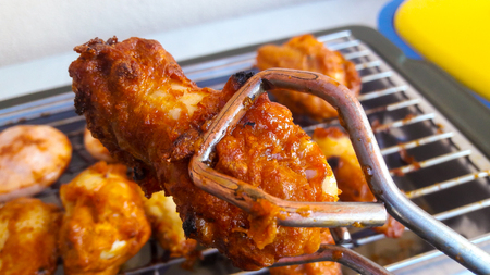 Grilled chicken Legs on the grill barbecue eat mealの写真素材