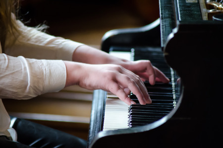 Playing piano music musician hands concert closeup