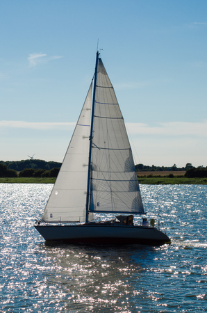 Sailing ship yachts with white sails oceanの写真素材