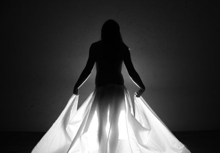 Female nude body in a dark - attractive beauty bodyの写真素材