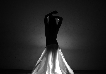 Female nude body in a dark - attractive beauty bodyの写真素材