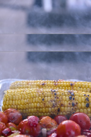 vegetables on the grill over low heat for preparingの写真素材