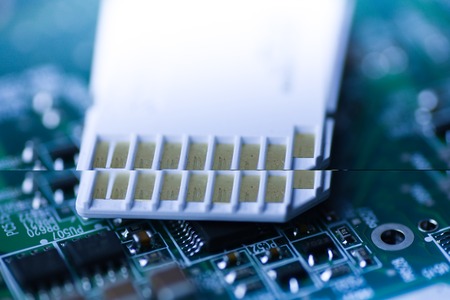SD Card with mainboard technical backgroundの写真素材