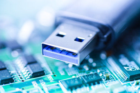 usb stick motherboard blue backgrodun close up memory storage