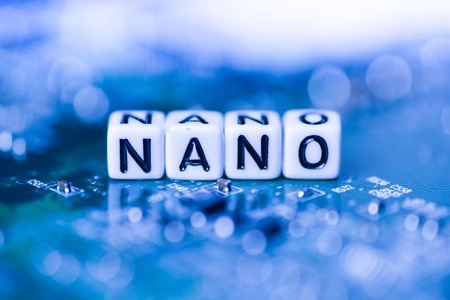 Word NANO formed by alphabet blocks on mother cryptocurrencyの写真素材