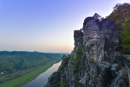 View of the River Elbe and the Mountains of the Swiss Saxony at Rathenの写真素材