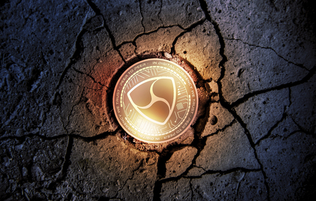 shiny golden NEM cryptocurrency coin on dry earth dessert background mining 3d rendering illustrationの写真素材