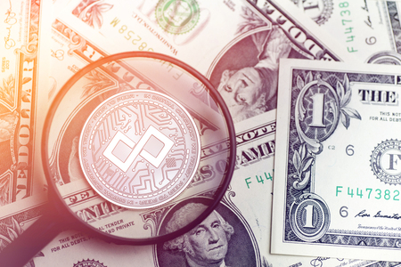 shiny golden TENX cryptocurrency coin on blurry background with dollar money 3d illustrationの写真素材