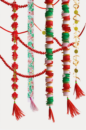 Colorful and traditional Chinese paper garlands isolated on white background, perfect for festive decorationsの素材
