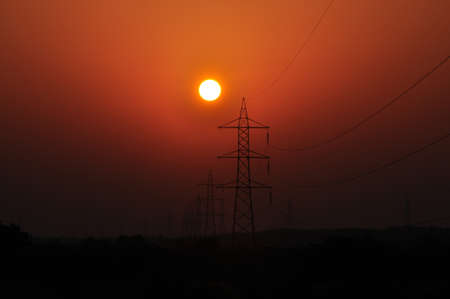 Sun and power linesの写真素材